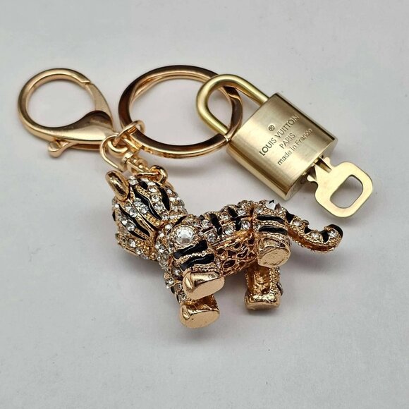 Authentic Louis Vuitton Lock & Key with unbranded Tiger Bagcharm, Keycharm - Picture 7 of 9